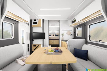 Interiér TQ 740 – otvorený priestor s dinetou, kuchyňou a oddelenou kúpeľňou.